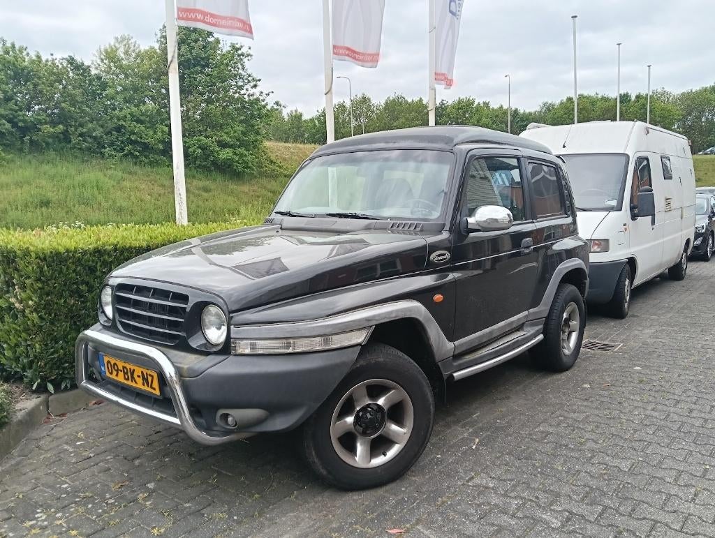 SsangYong Korando 2.9 TD HR 2003 Mercedes-Benz OM602 motor, Auto's, Stof, Zwart, Origineel Nederlands, Particulier
