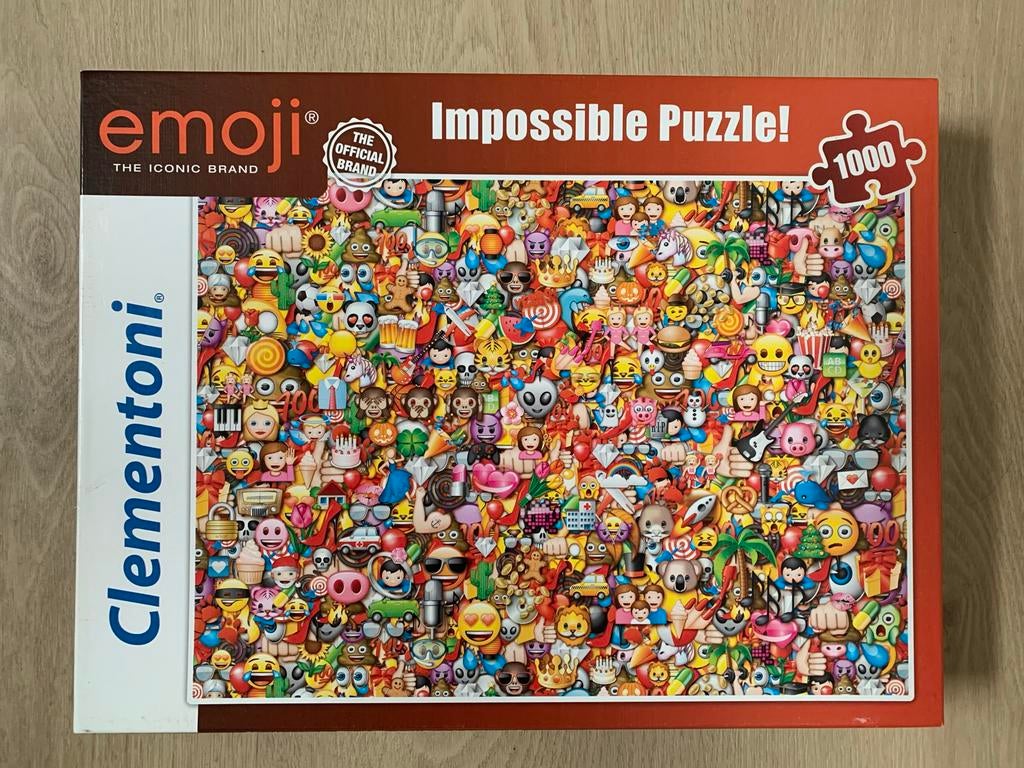 Puzzel - Clementoni emoij impossible 1000 stukjes, Ophalen of Verzenden, 500 t/m 1500 stukjes, Zo goed als nieuw, Legpuzzel