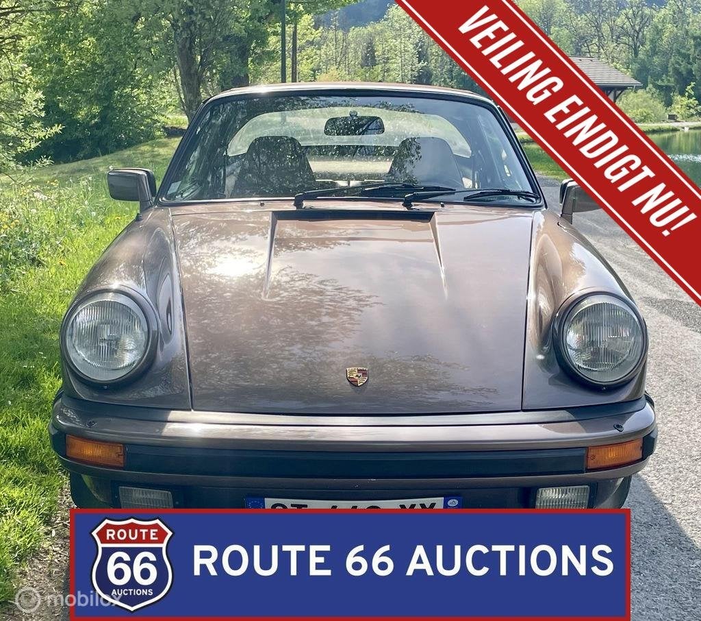 Porsche 911 Carrera 3.2 Cabriolet | 1984 | Route 66 Auctions, Auto's, Oldtimers, Overige carrosserieën, Zwart, Bedrijf, Porsche