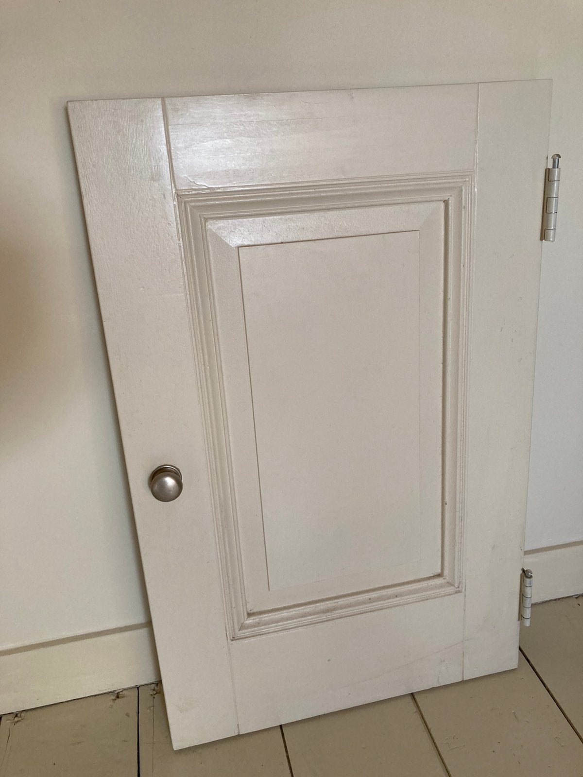 Houten kast deurtje, Ophalen
