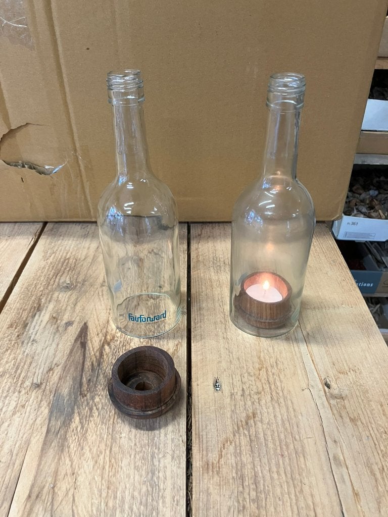 partij 150 stuks fairtrade theelichten in fles, Ophalen, Waxinelichthouder, Nieuw, Glas