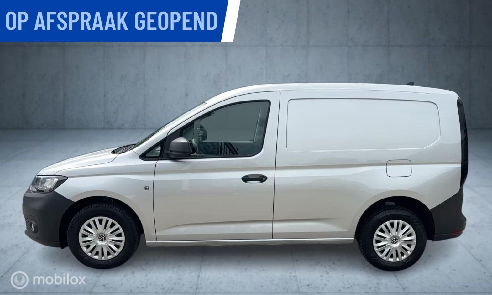 Volkswagen Caddy Cargo 2.0 TDI Comfort I 102 pk I Camera I, Auto's, Gebruikt, Zwart, 4 cilinders, Met garantie (alle)