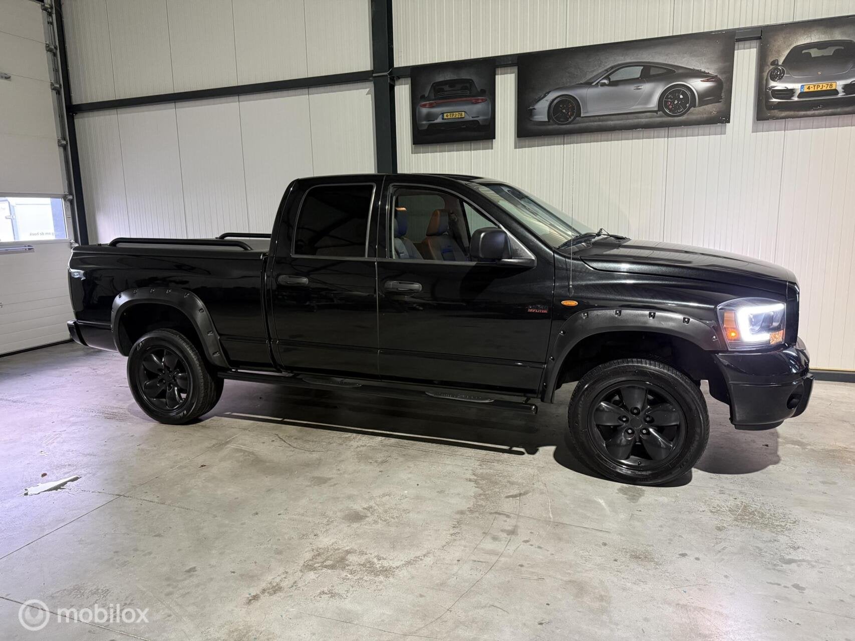 Dodge Ram 1500 sport 4x4 LPG Nieuwe apk, Auto's, Verwarmde buitenspiegels, Gebruikt, 8 cilinders, Bedrijf