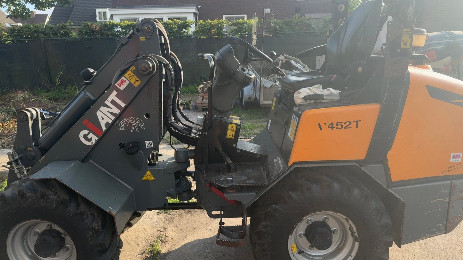Loader + minigraver te huur, Ophalen