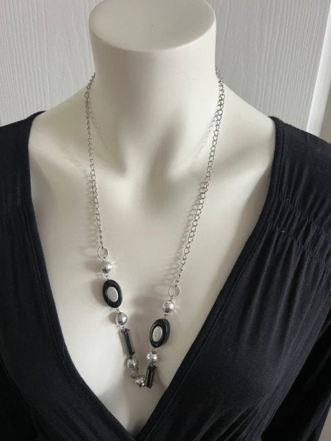 Lange ketting, Ophalen of Verzenden, Zo goed als nieuw, Zwart, Overige materialen
