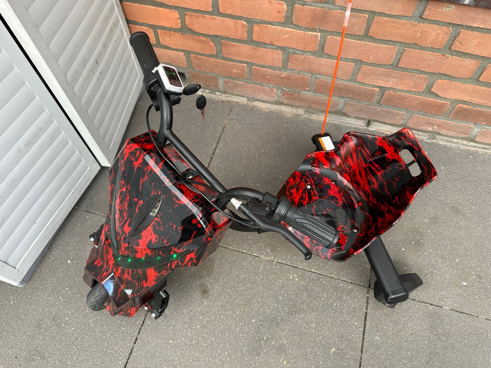 Elektrische Drift Trike - Rood/Zwart Vlammen Design, Ophalen of Verzenden, Zo goed als nieuw, Trommelrem