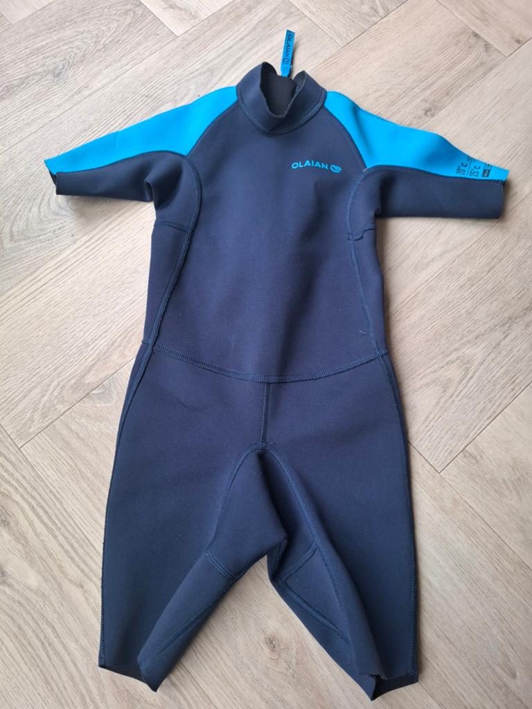 Wetsuit/surfpak shorty Olaian 123-130cm 7-8 jaar, Watersport en Boten, Watersportkleding, Ophalen of Verzenden, Zo goed als nieuw