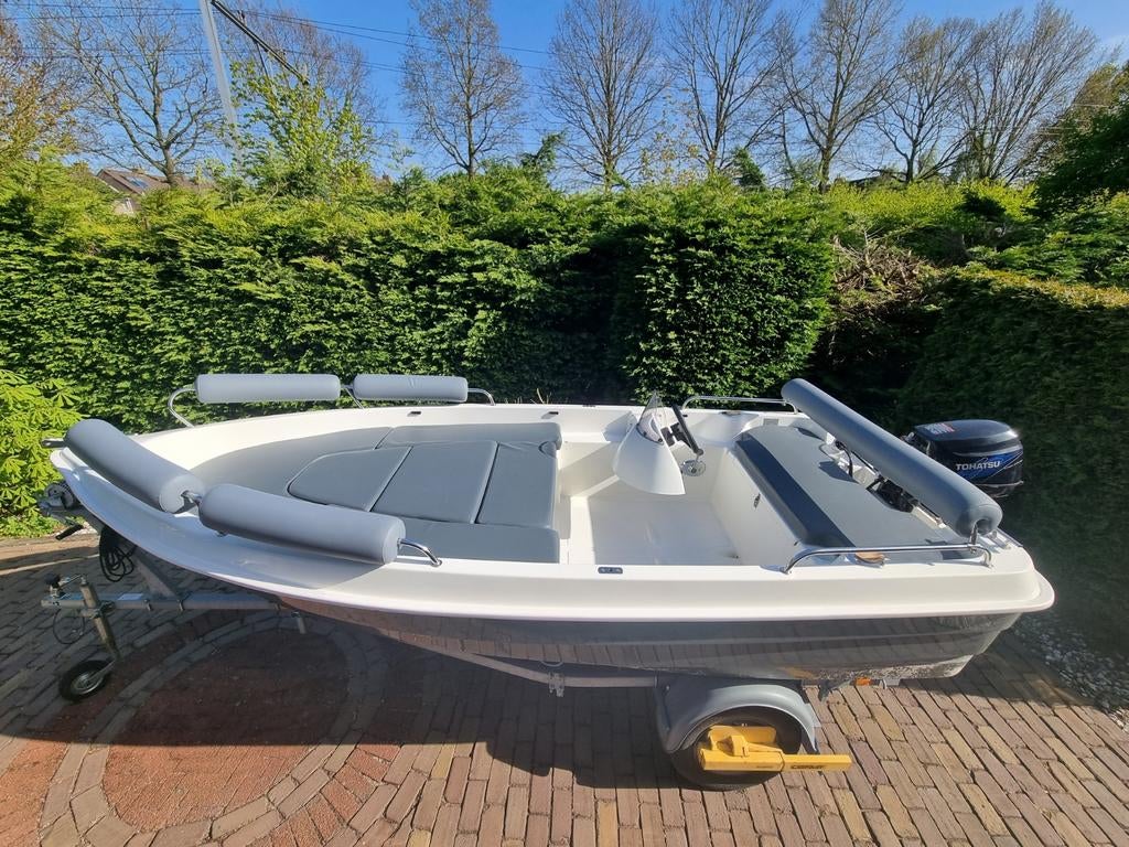 Zeer nette consoleboot (2021) met trailer, direct vaarklaar!, Watersport en Boten, Vis- en Consoleboten, Tot 10 pk, Ophalen of Verzenden