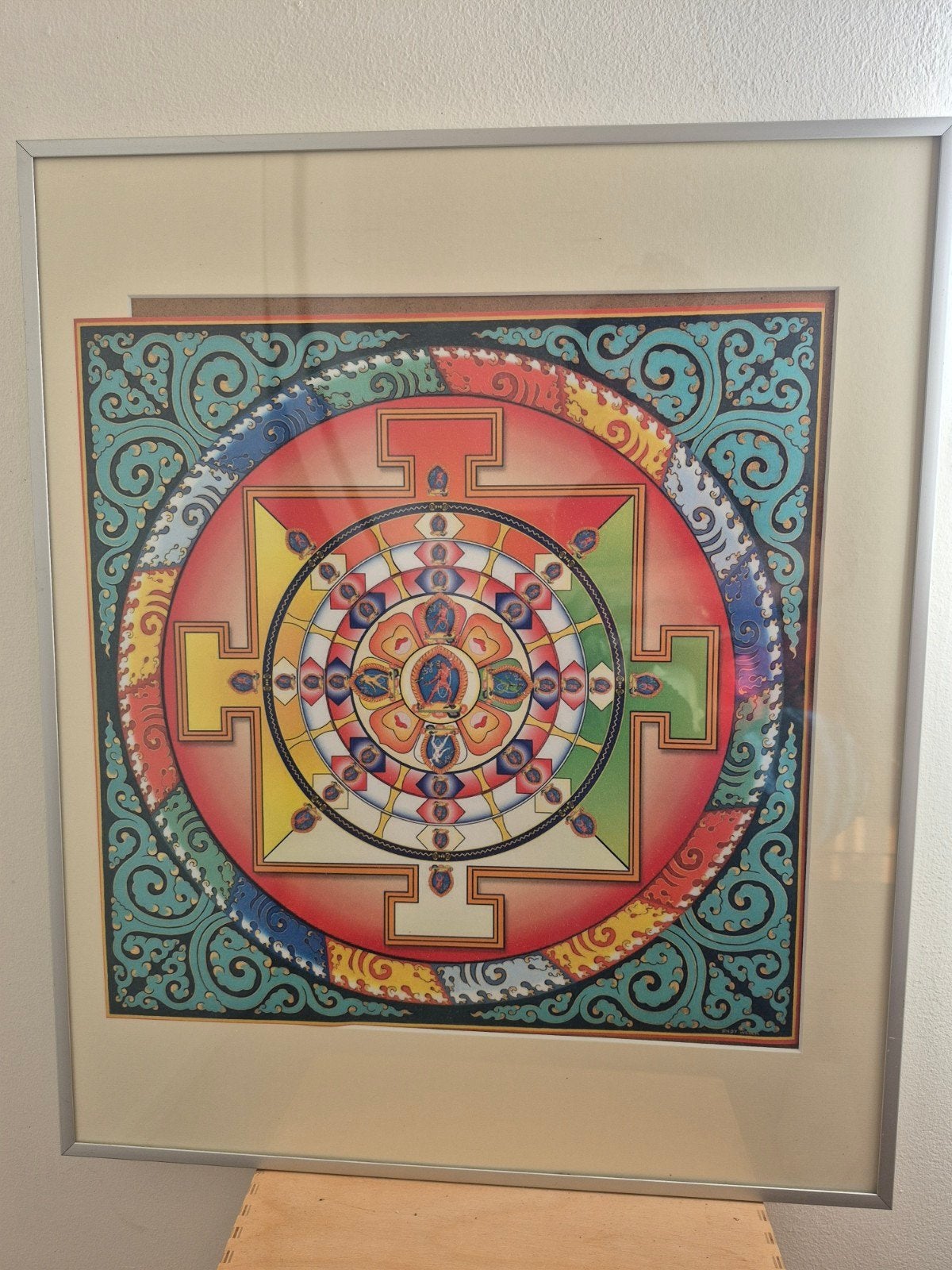 Mandala Shambala in lijst, Ophalen
