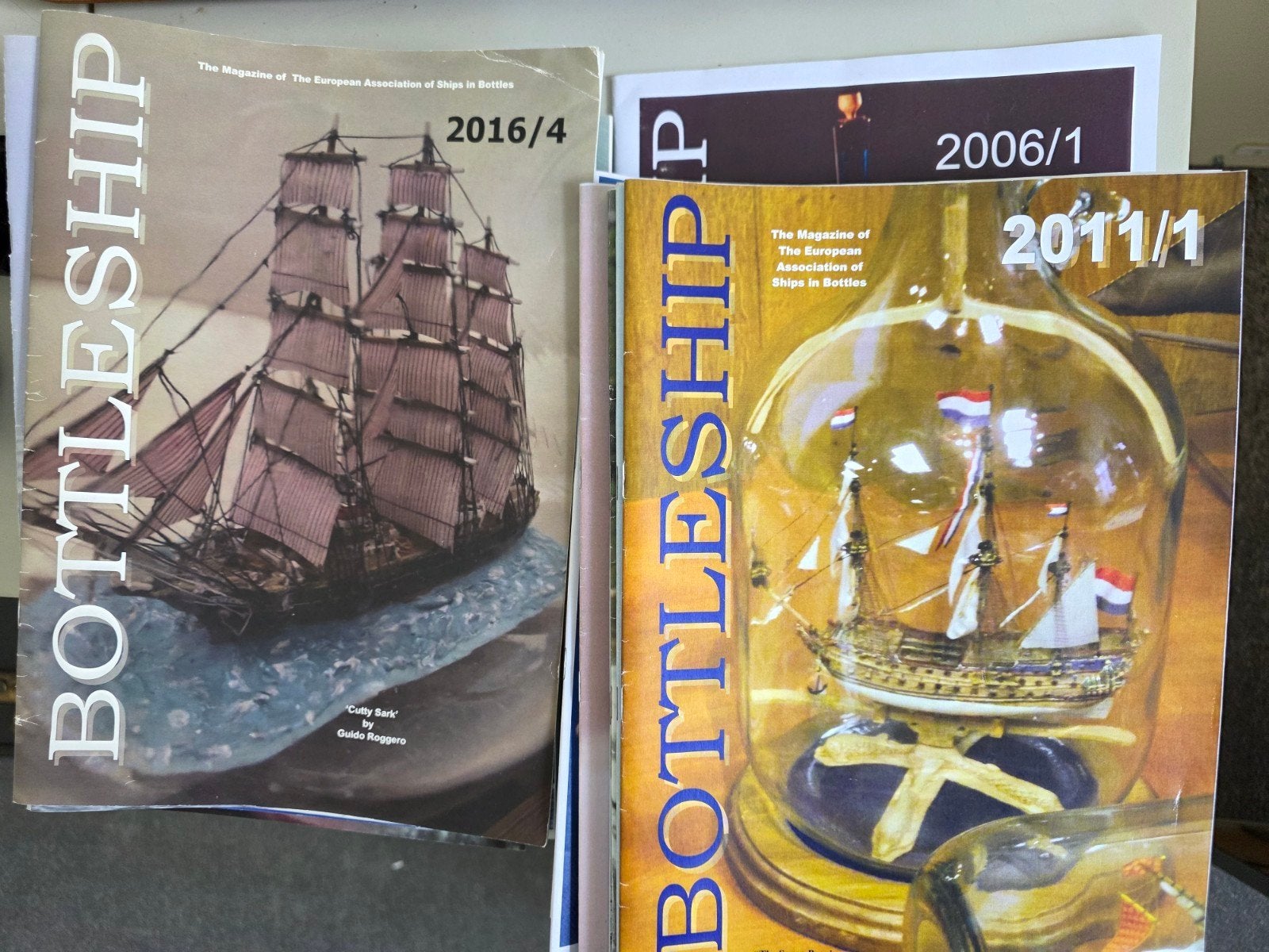 Bottleship  10 jaargangen  modelbouw in fles, Ophalen of Verzenden