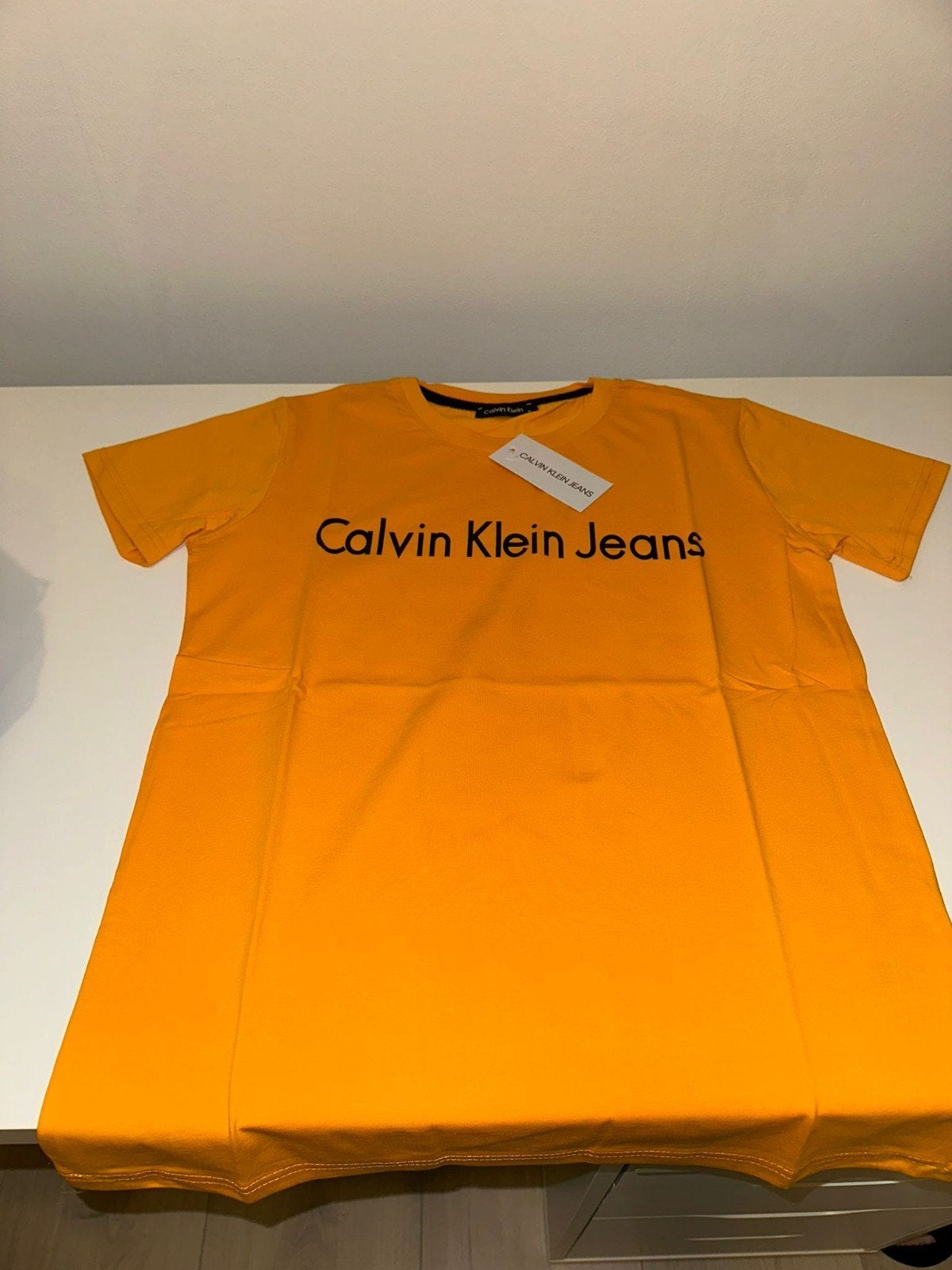 Calvin Klein Jeans T-shirt - Maat S, Nieuw, Oranje, Ophalen of Verzenden, Calvin Klein Jeans