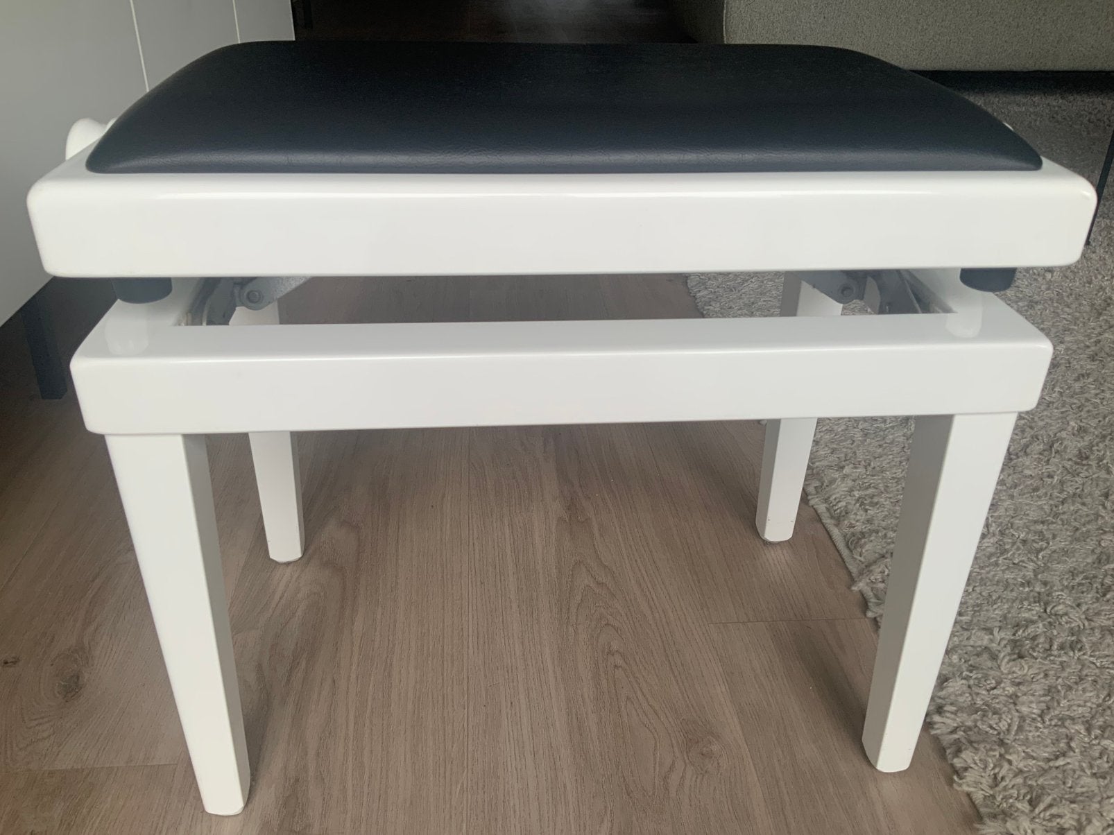Te koop verstelbare pianobank van Andexinger, Ophalen, Zo goed als nieuw