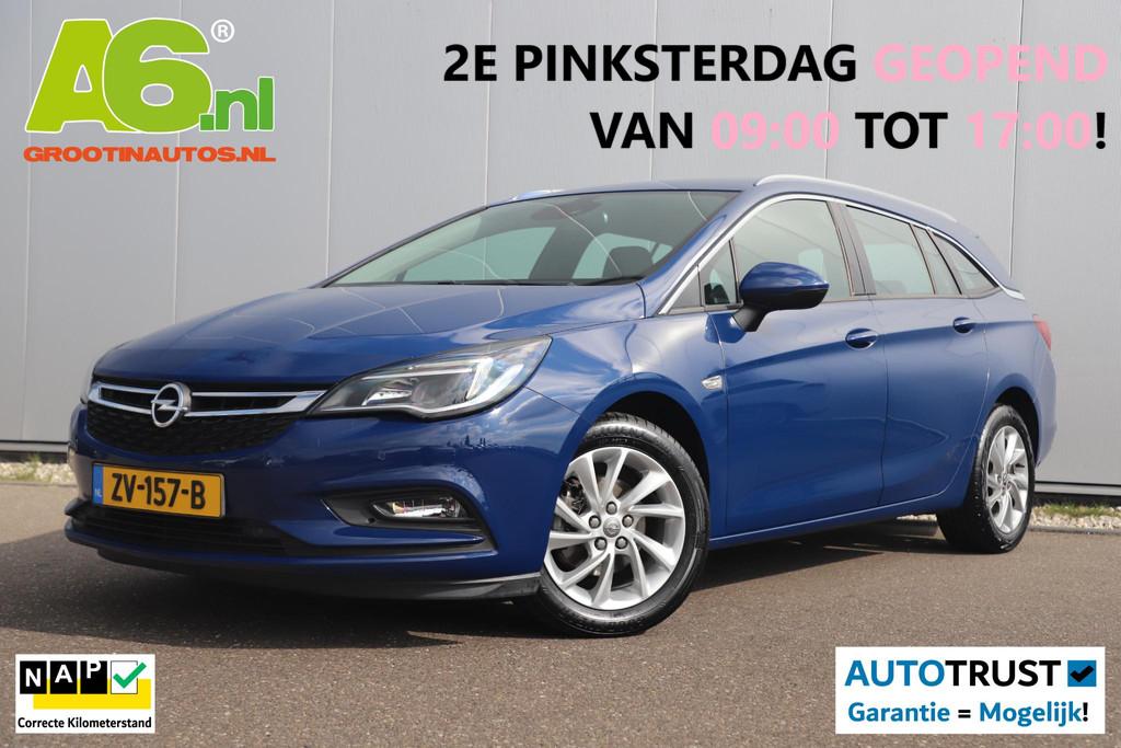 Opel Astra Sports Tourer 1.0 Turbo Business Executive 105PK, Stof, Gebruikt, 1178 kg, Met garantie (alle)