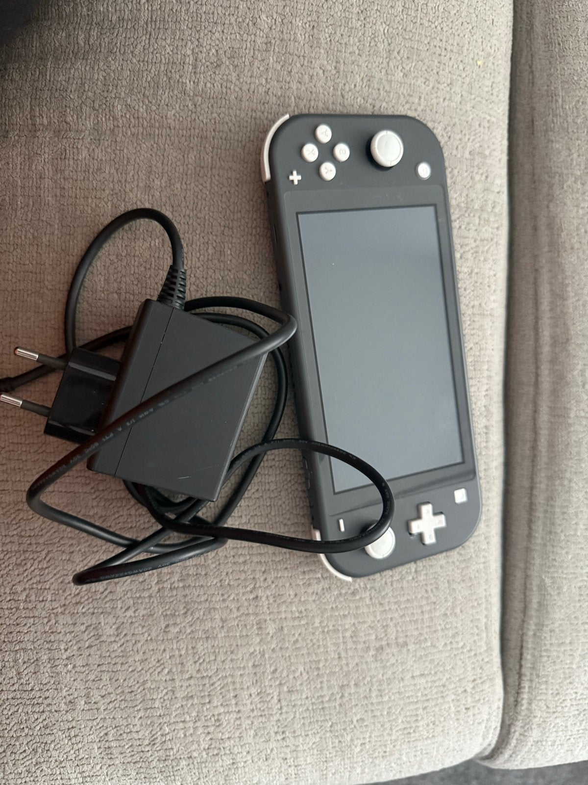 Nintendo Switch Lite met oplader, Spelcomputers en Games, Ophalen of Verzenden, Gebruikt, Met 1 controller, Switch Original