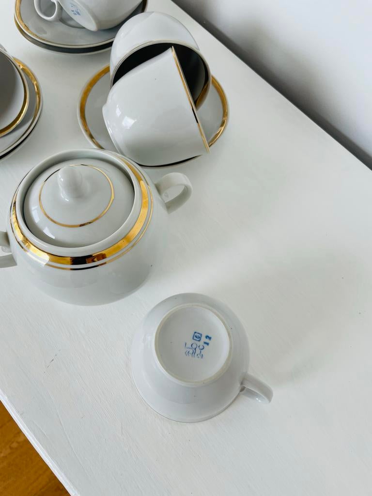 Servies set met gouden rand, Antiek en Kunst, Ophalen of Verzenden