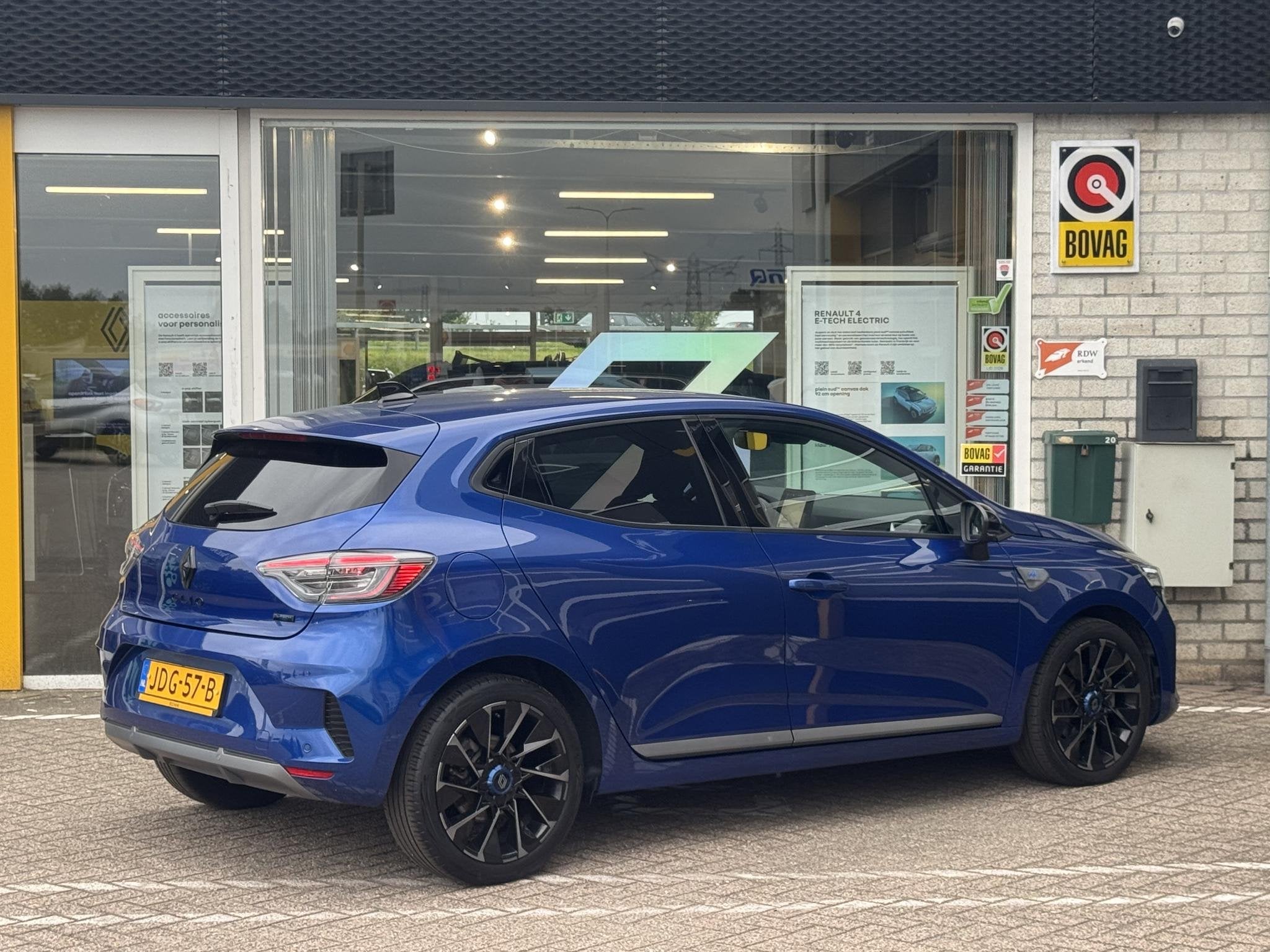Renault Clio 1.6 E-Tech Full Hybrid 145 esprit Alpine | NAP, Auto's, Gebruikt, Euro 6, Blauw, Leder en Stof