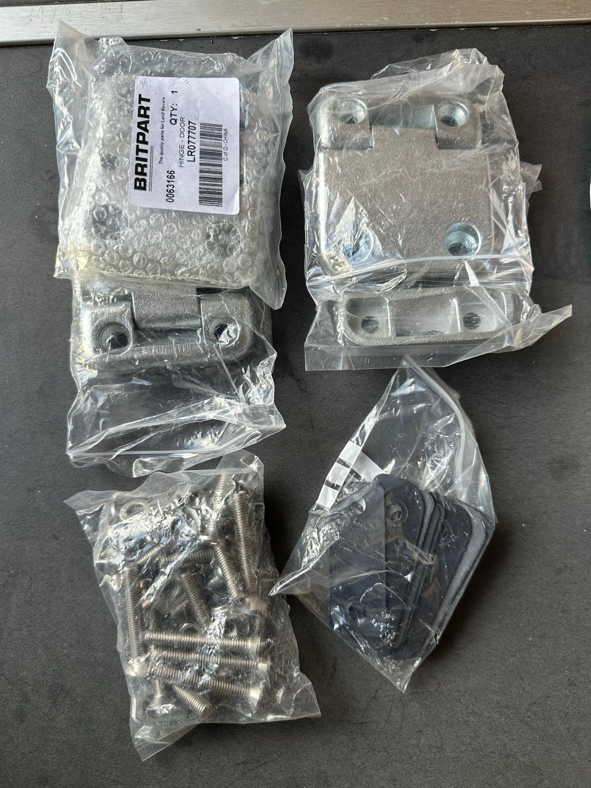 Verzinkt deurscharnier set voor Land Rover Defender (LR07770, Land Rover, Nieuw, Ophalen of Verzenden, Voor