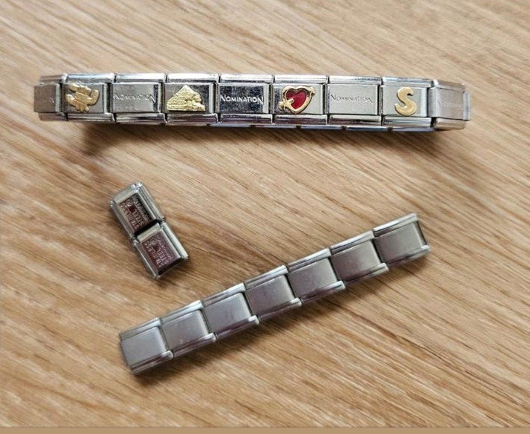 Vintage Nomination armband RVS met extra schakels, Gebruikt, Staal, Ophalen of Verzenden, Met bedels of kralen