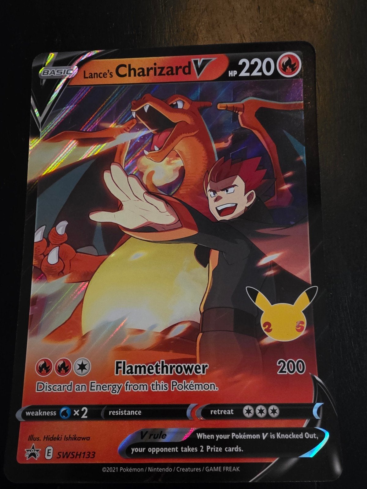 Lance's Charizard V SWSH133 Pokémon Kaart Celebrations, Ophalen of Verzenden, Zo goed als nieuw, Losse kaart