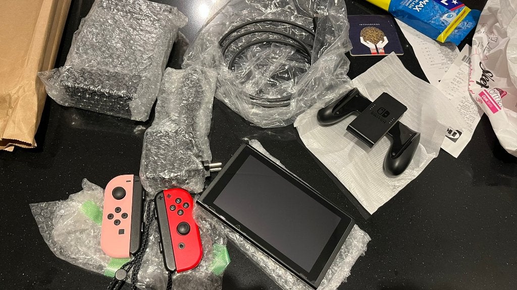 Nintendo Switch v1 unpatched compleet met screenprotector, Spelcomputers en Games, Ophalen of Verzenden, Zo goed als nieuw, Met 2 controllers