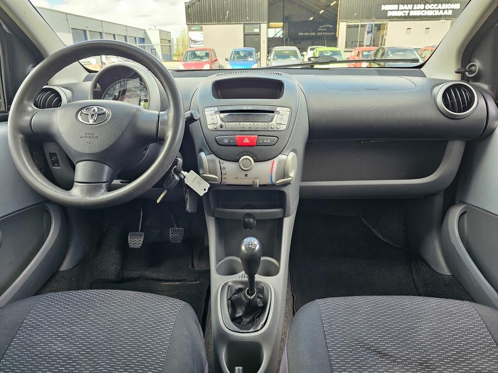 Toyota Aygo 1.0-12V|Airco|El. Ramen|AUX|5 deurs|APK, Auto's, Toyota, Voorwielaandrijving, Stof, Gebruikt, Huisgarantie