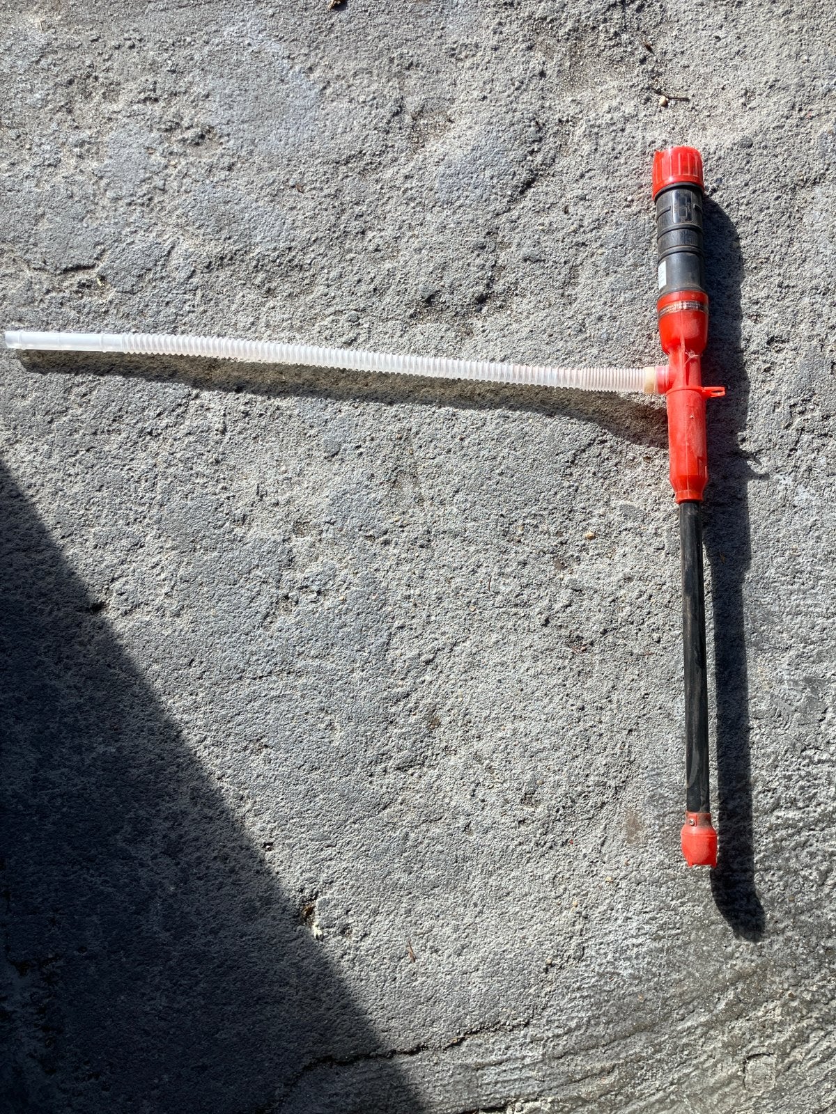 Handmatige brandstofpomp met slang, Ophalen