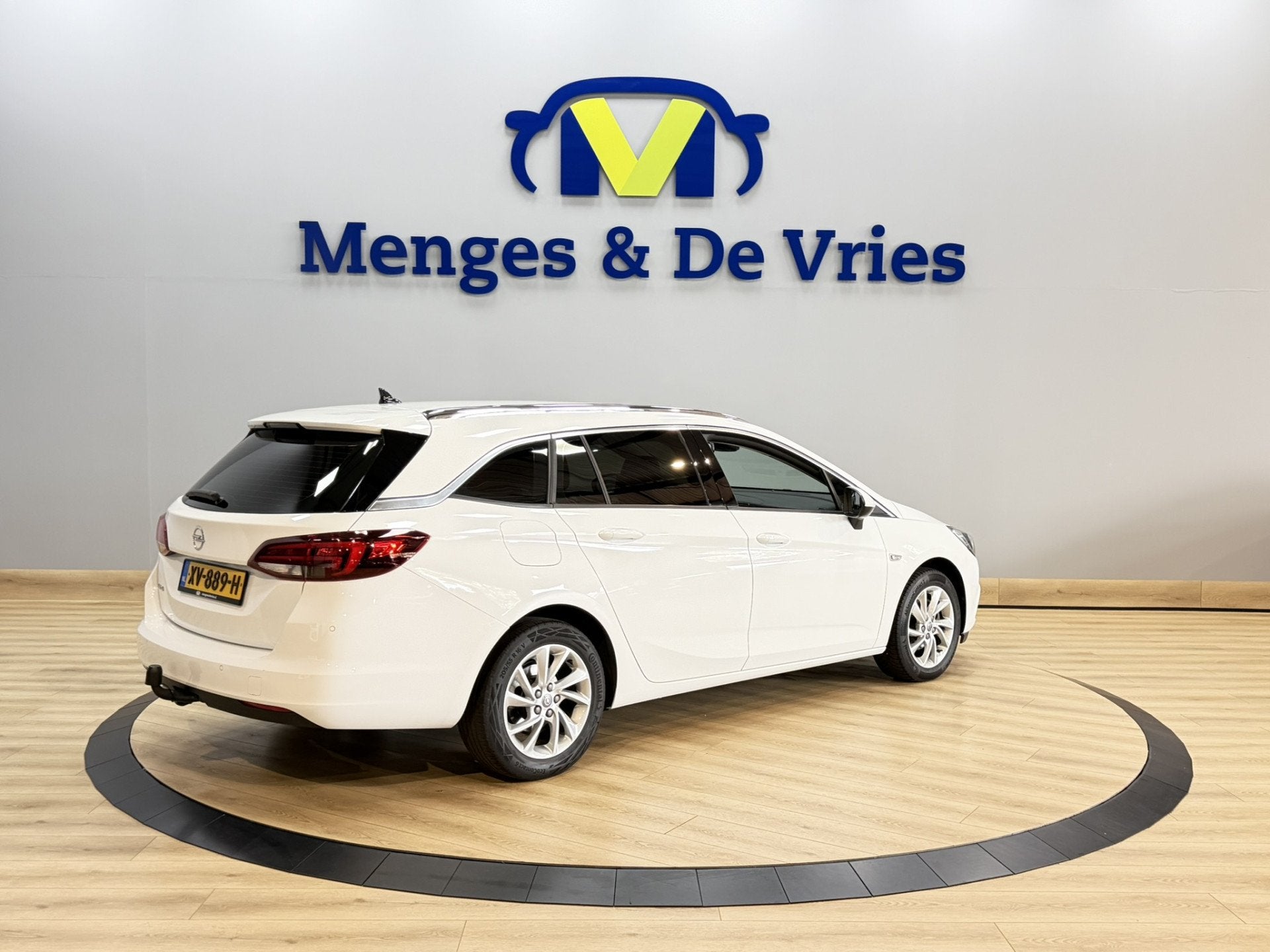 Opel Astra Sports Tourer 1.4 Turbo Innovation Airco ECC | Tr, 12 maanden, Gebruikt, Leder en Stof, Wit