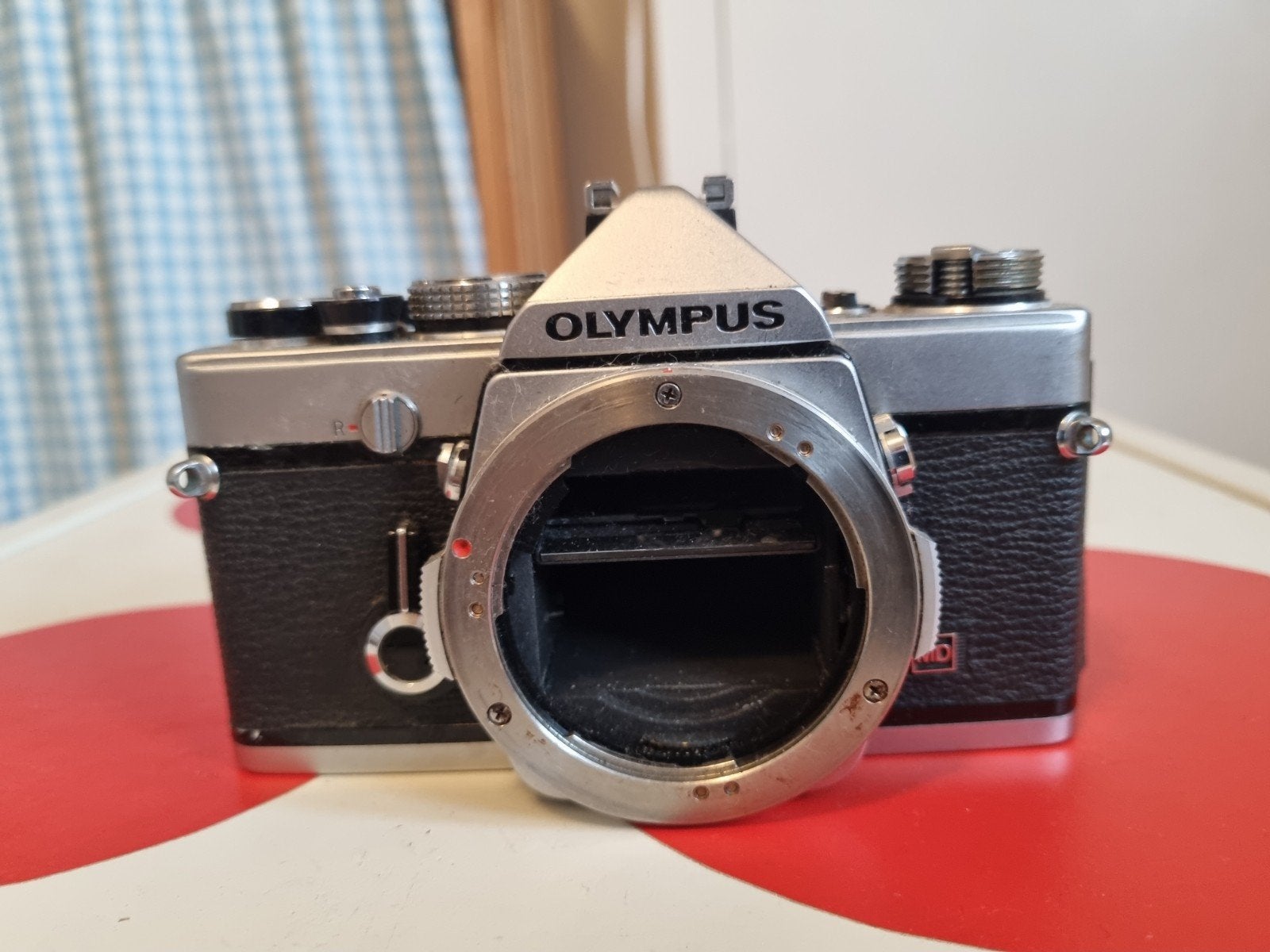 Olympus OM-1 Spiegelreflexcamera - Voor reparatie/onderdelen, Audio, Tv en Foto, Ophalen of Verzenden, Niet werkend, Spiegelreflex
