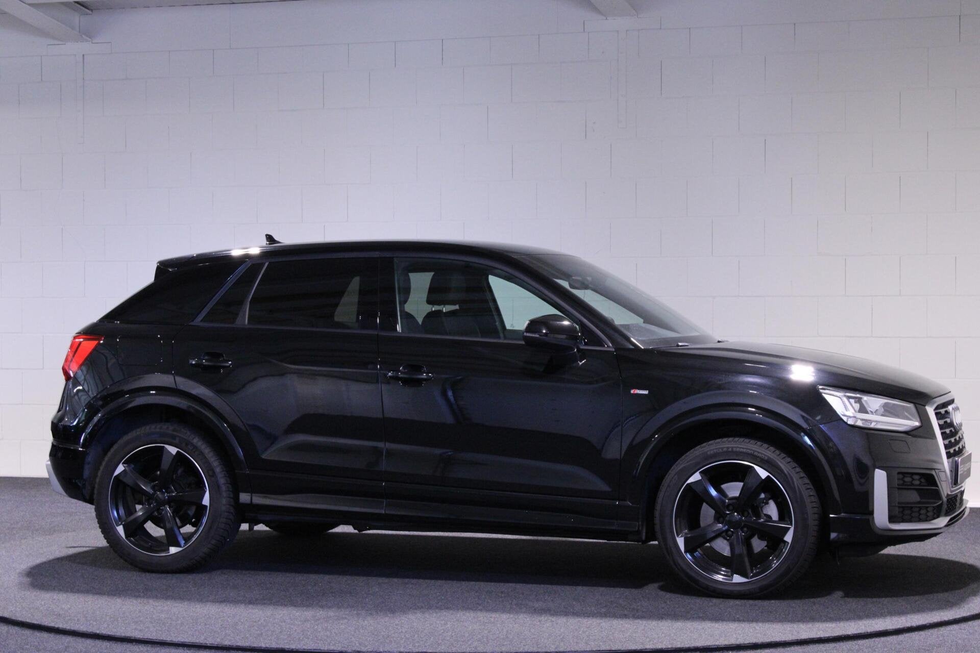Audi Q2 1.4 TFSI CoD Sport Pro Line S | PDC | Trekhaak, Auto's, Gebruikt, 4 cilinders, Leder en Stof, Zwart