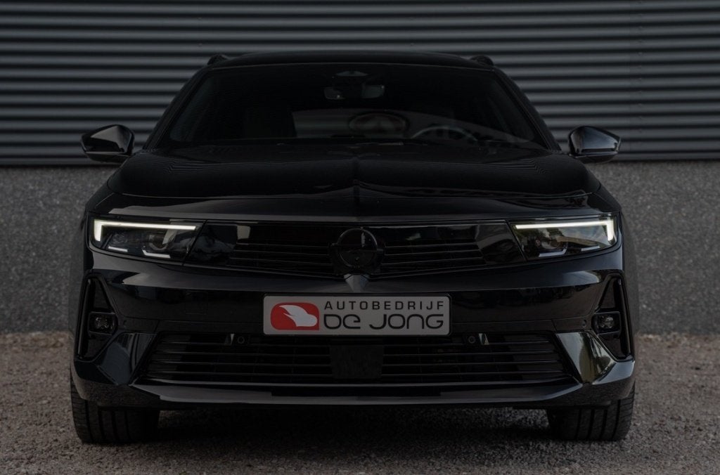 Opel Astra Sports Tourer 1.6 T PHEV Ultimate 180PK | Pano |, Auto's, Opel, 77 km/l, Gebruikt, Zwart, Plug-in hybride