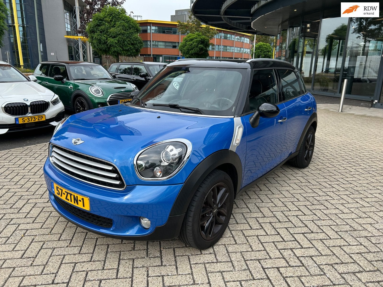 Mini Countryman 1.6 Cooper AIRCO/CRUISE/LEER/PDC/NAVI/NLAUTO, Voorwielaandrijving, Gebruikt, Blauw, 122 pk