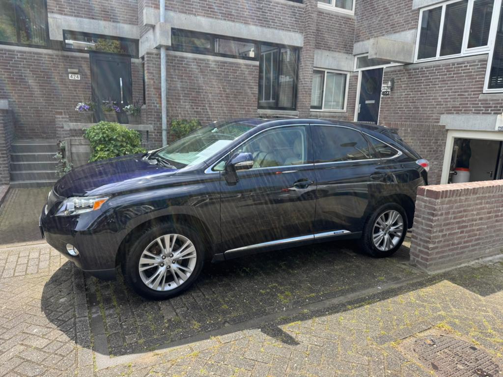 Youngtimer Lexus RX(-H) 450h Hybrid 299pk CVT 2010 Blauw, Auto's, Lexus, Automaat, 249 pk, 2000 kg, Blauw