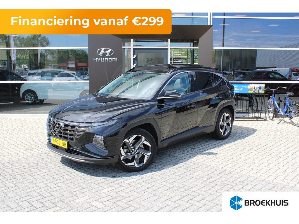 Hyundai Tucson 1.6 T-GDI 265pk PHEV Premium Sky 4WD | Schuif, Auto's, Hyundai, 12 maanden, Gebruikt, Overige carrosserieën, Overige brandstoffen