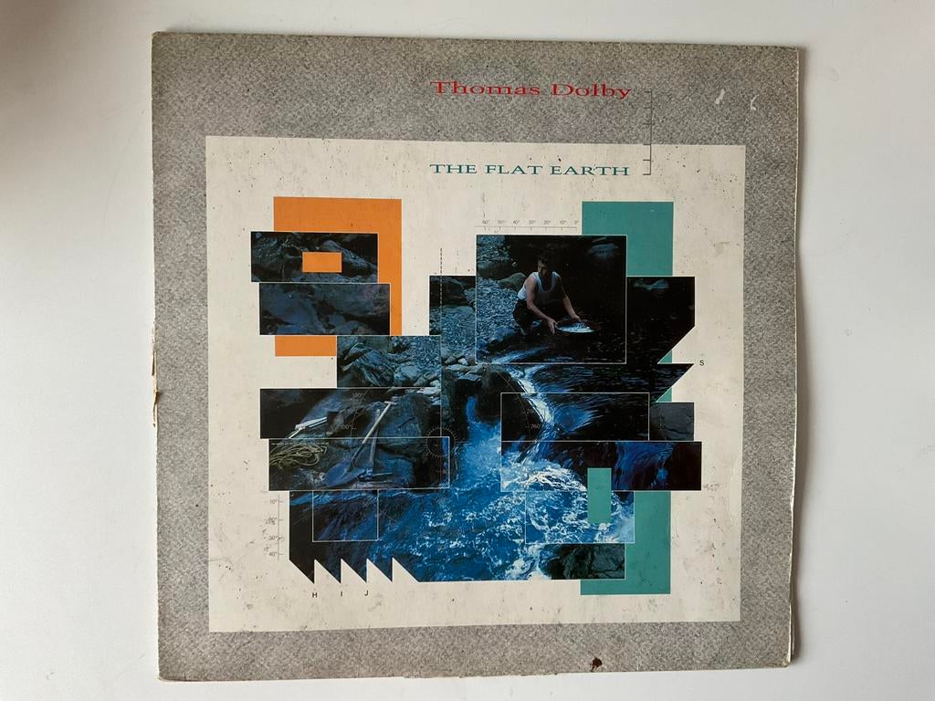 Thomas Dolby – The Flat Earth LP Synth pop, Ophalen of Verzenden, 1980 - 1989, Gebruikt, 12 inch