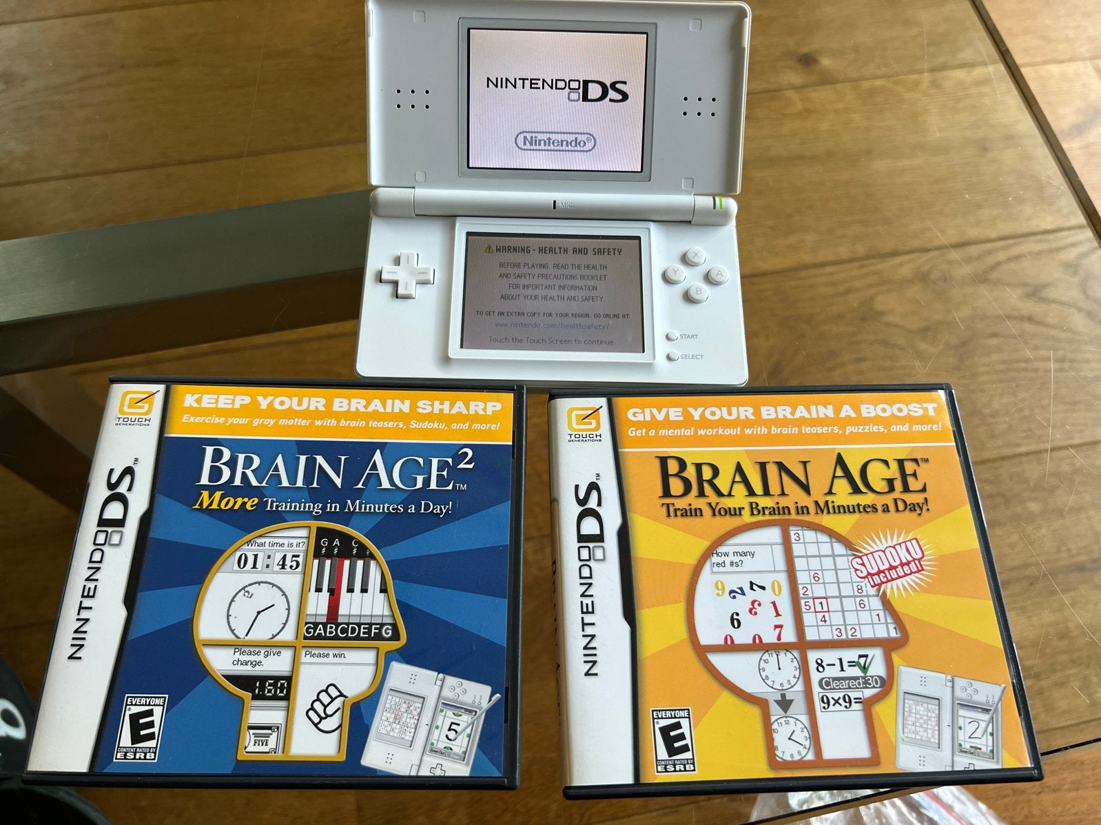 Nintendo DS Lite Wit met 2 Brain Age training games, Ophalen, Wit, DS Lite, Gebruikt