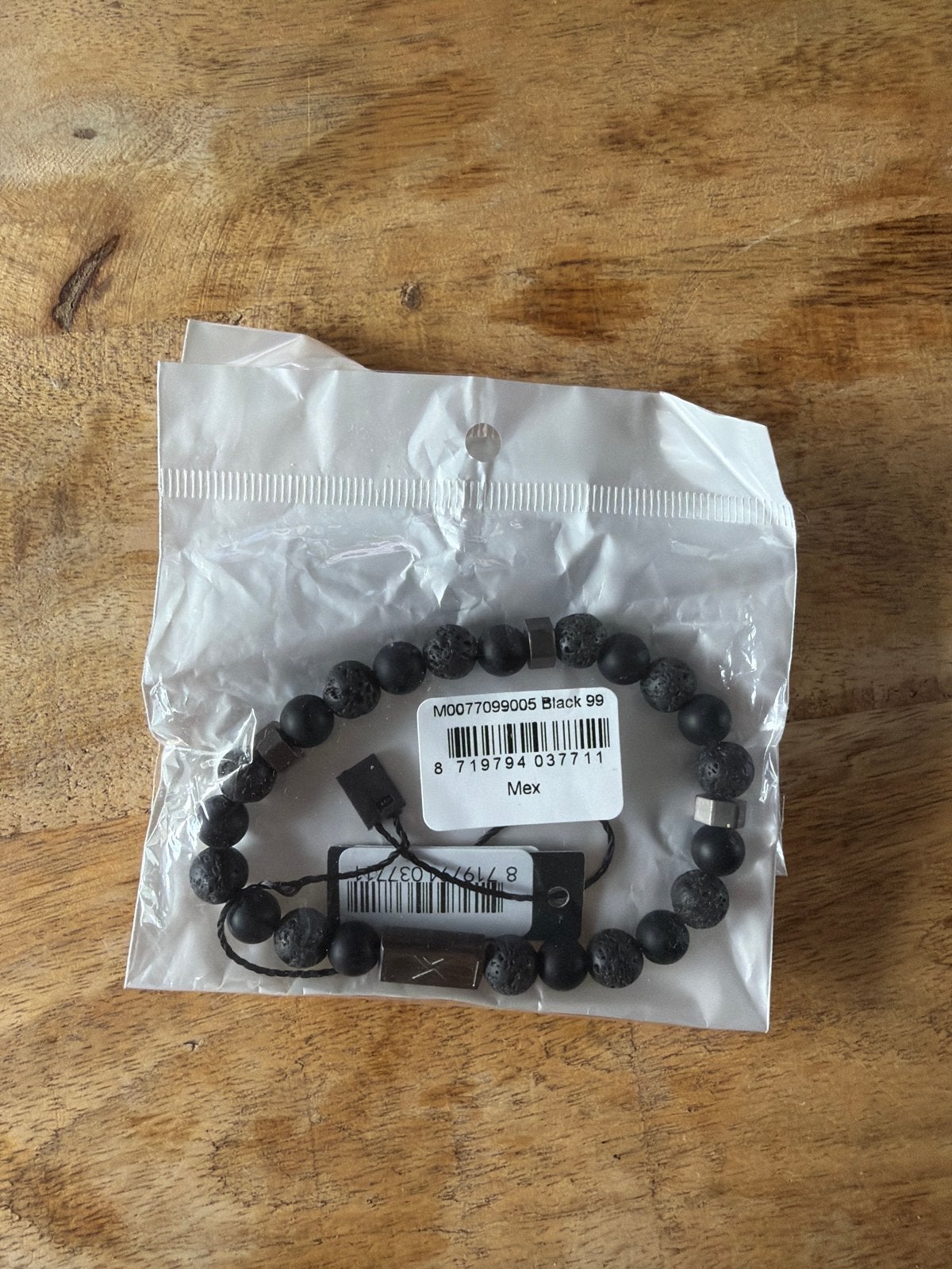 Ixxxi armband met zwarte lavasteen kralen, Ophalen of Verzenden, Nieuw, Zwart, Overige materialen