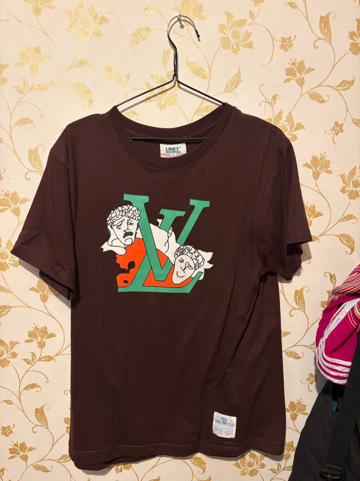 Bruin T-shirt met opvallende print - Maat M, Ophalen of Verzenden, Zo goed als nieuw, Maat 48/50 (M), Bruin