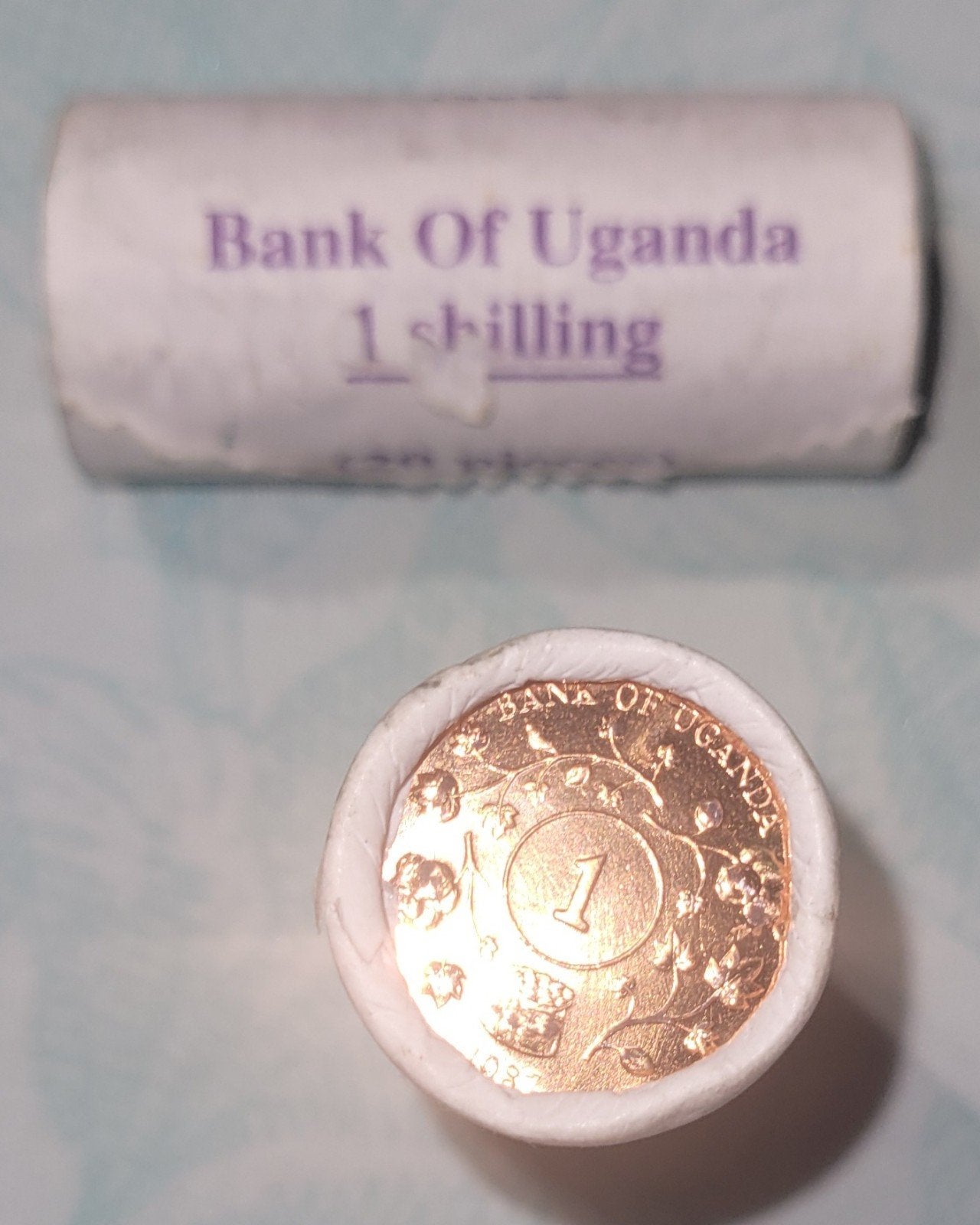 Een rol van 1 schelling van uganda, Postzegels en Munten, Ophalen of Verzenden, Overige landen, 2 euro
