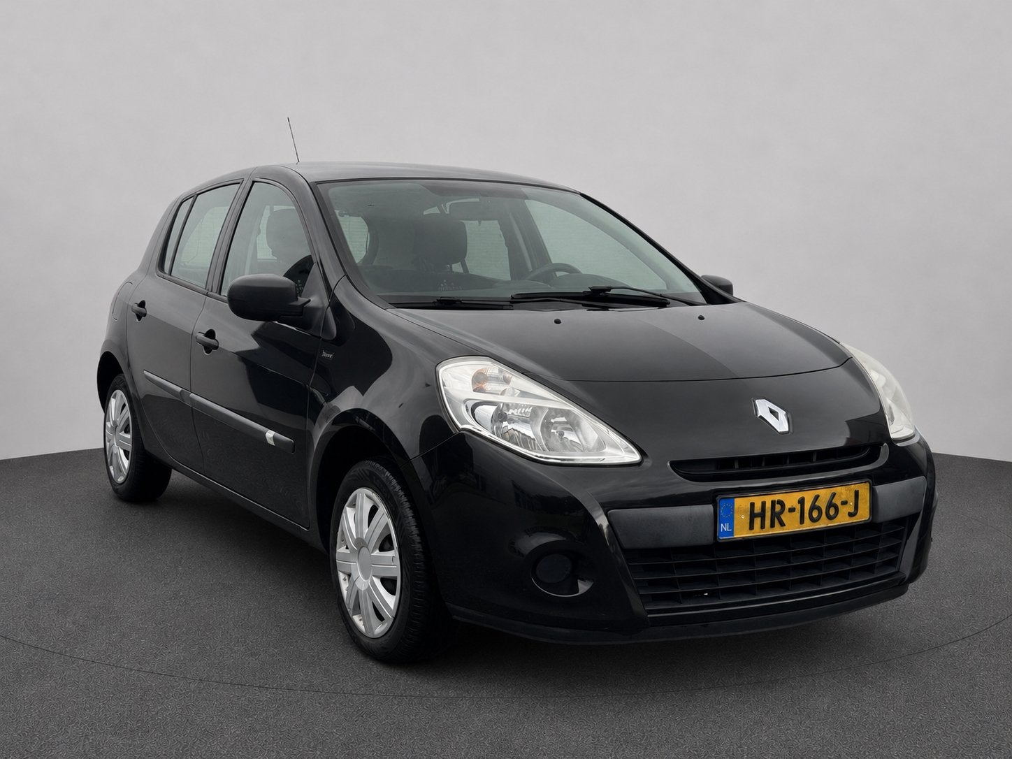 Renault Clio 1.2 16V 5 Deurs, Airco, Trekhaak, Auto's, Voorwielaandrijving, Stof, 74 pk, Zwart