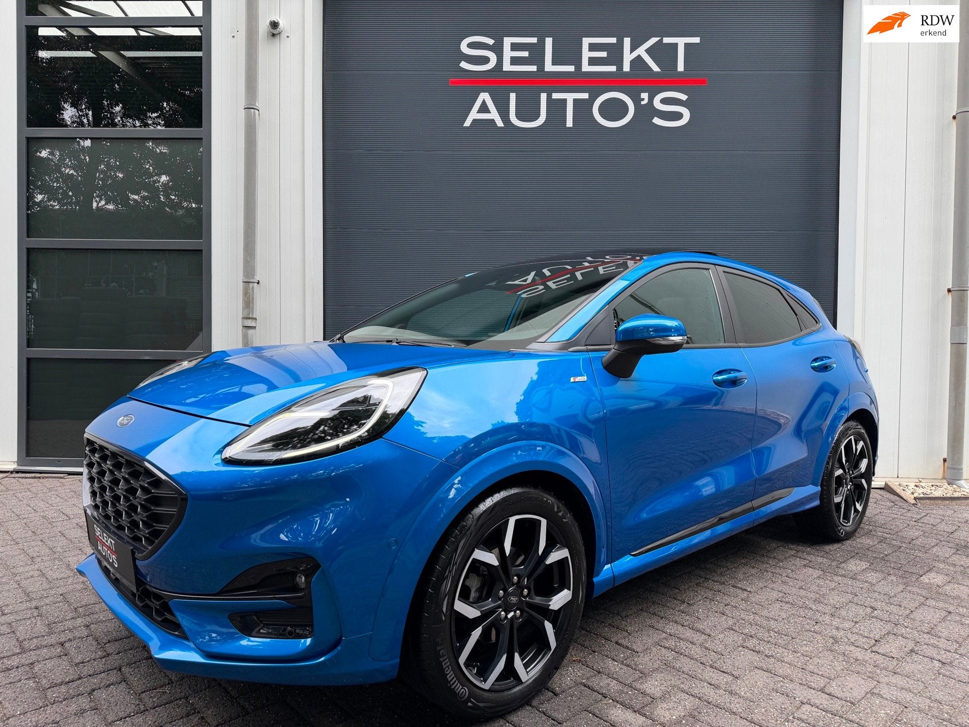 Ford Puma 1.0 EcoBoost Hybrid ST-Line X 125 Pk Pano/Navi/LED, Auto's, Voorwielaandrijving, 125 pk, Zwart, Blauw
