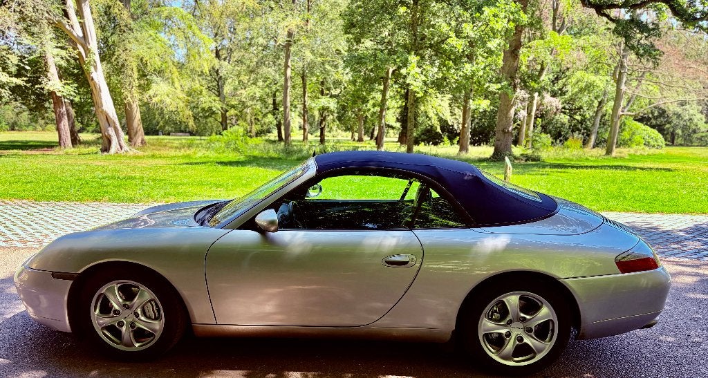 Porsche 911 Carrera 4 Cabriolet 1998 Uniek.64K Km.Origineel., Auto's, 4x4, Cabriolet, 4 stoelen, Leder