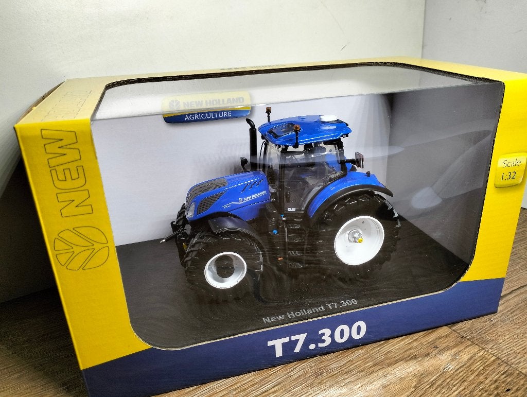 Te koop UH New Holland T7.300., Ophalen of Verzenden, Nieuw, Tractor of Landbouw, Universal Hobbies