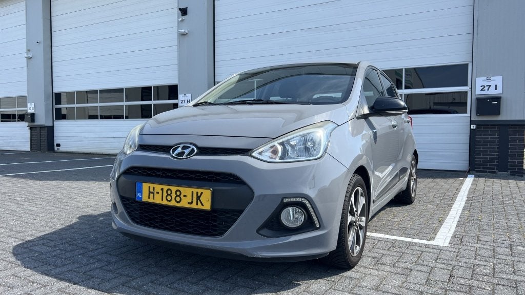 Hyundai i10 1.0i i-Motion Comf. (bj 2015), Auto's, Hyundai, Euro 5, 31 €/maand, Bedrijf, Handgeschakeld