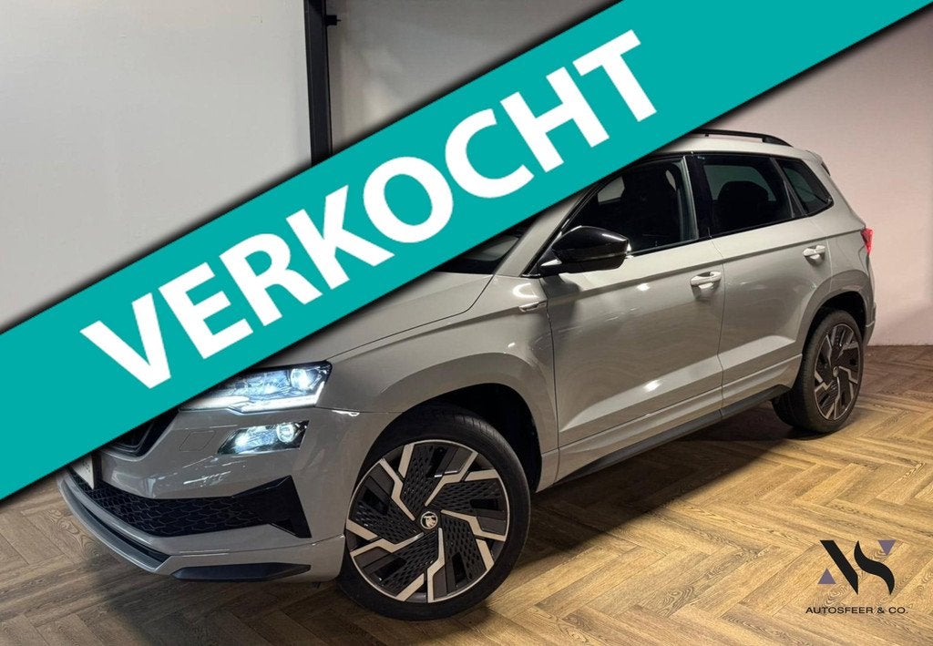 Skoda Karoq 1.5 TSI ACT Sportline Business KEYLESS CAM SFEER, Auto's, Skoda, Zwart, 4 cilinders, Alcantara, 1317 kg