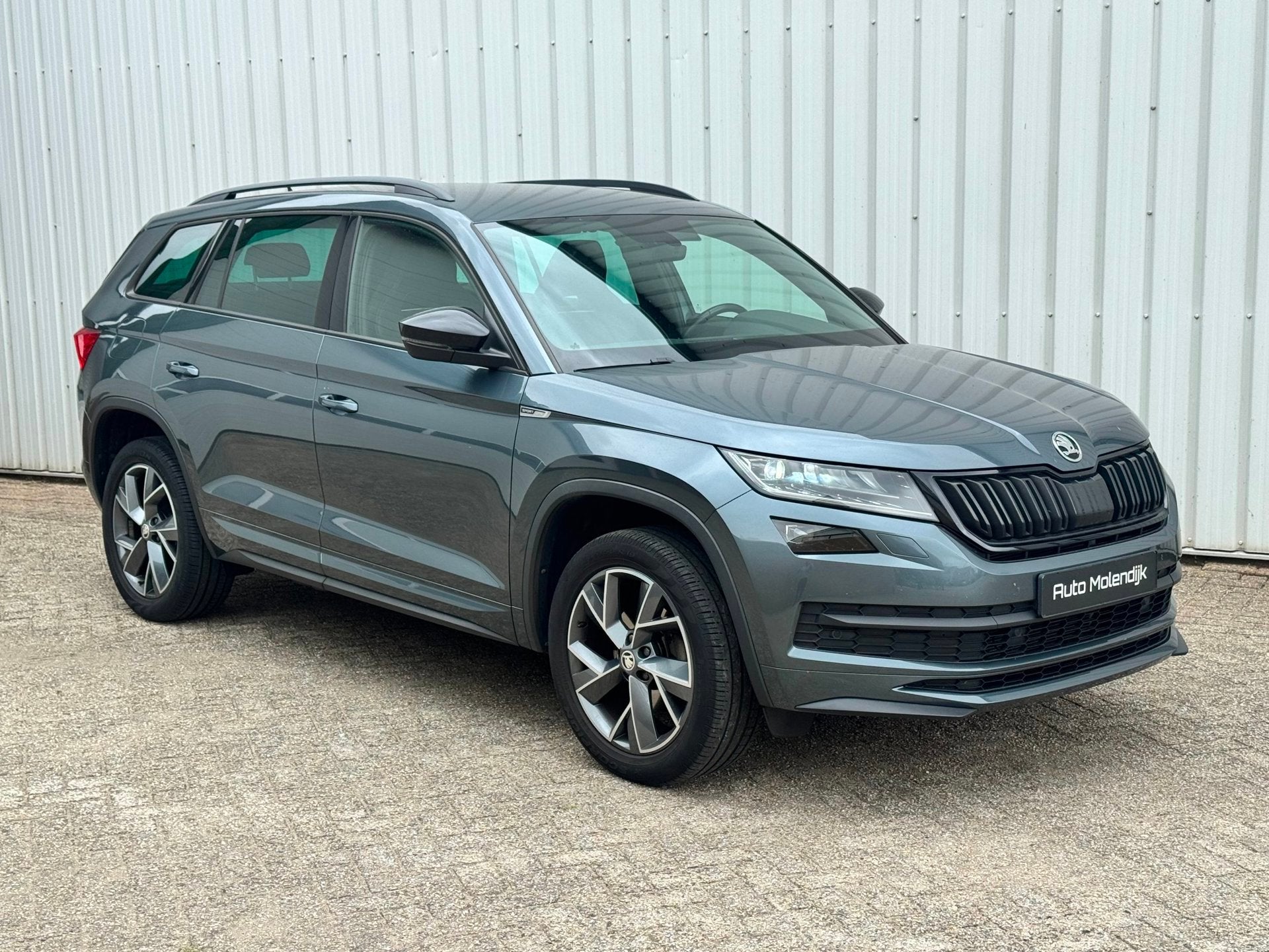 Skoda Kodiaq 1.5 TSI 150 PK DSG Sportline / Camera / Trekhaa, Auto's, Zwart, 4 cilinders, 150 pk, Origineel Nederlands