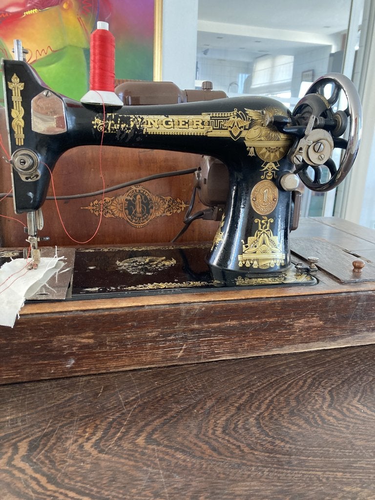 singer antieke naaimachine elektrisch, Ophalen