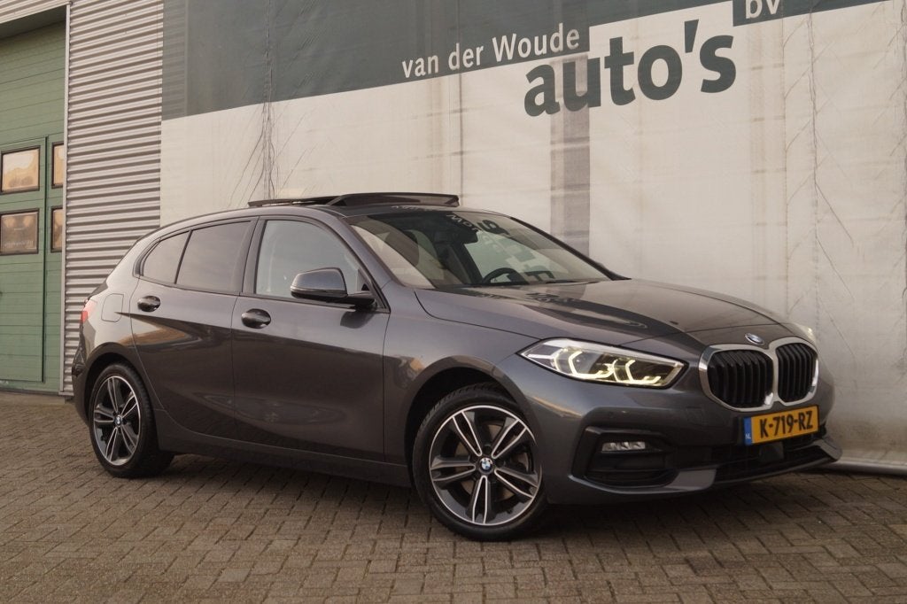 BMW 1-serie 118i 136pk Automaat High Executive -PANO-NAVI-EC, Auto's, Dealer onderhouden, 136 pk, Gebruikt, Automatische klimaatregeling