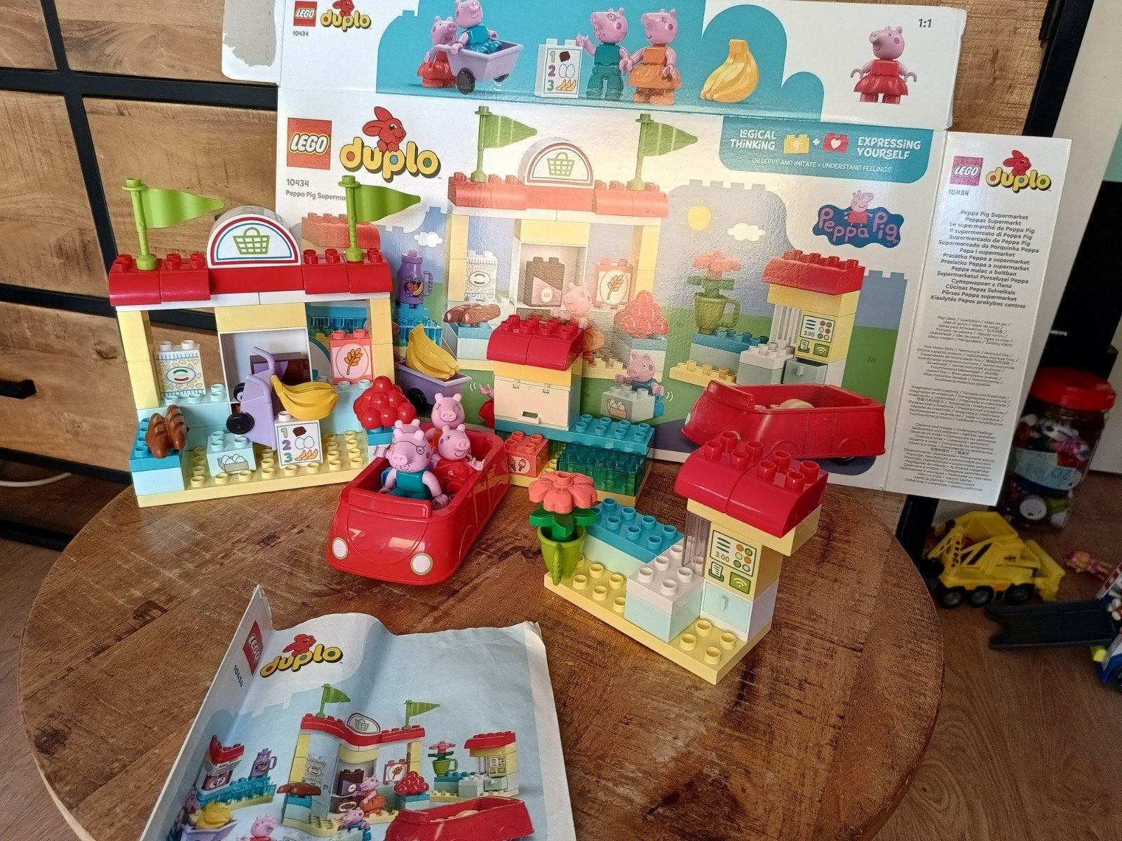 lego duplo 10434 winkel Peppa pig compleet met boek en doos, Ophalen of Verzenden, Zo goed als nieuw, Duplo