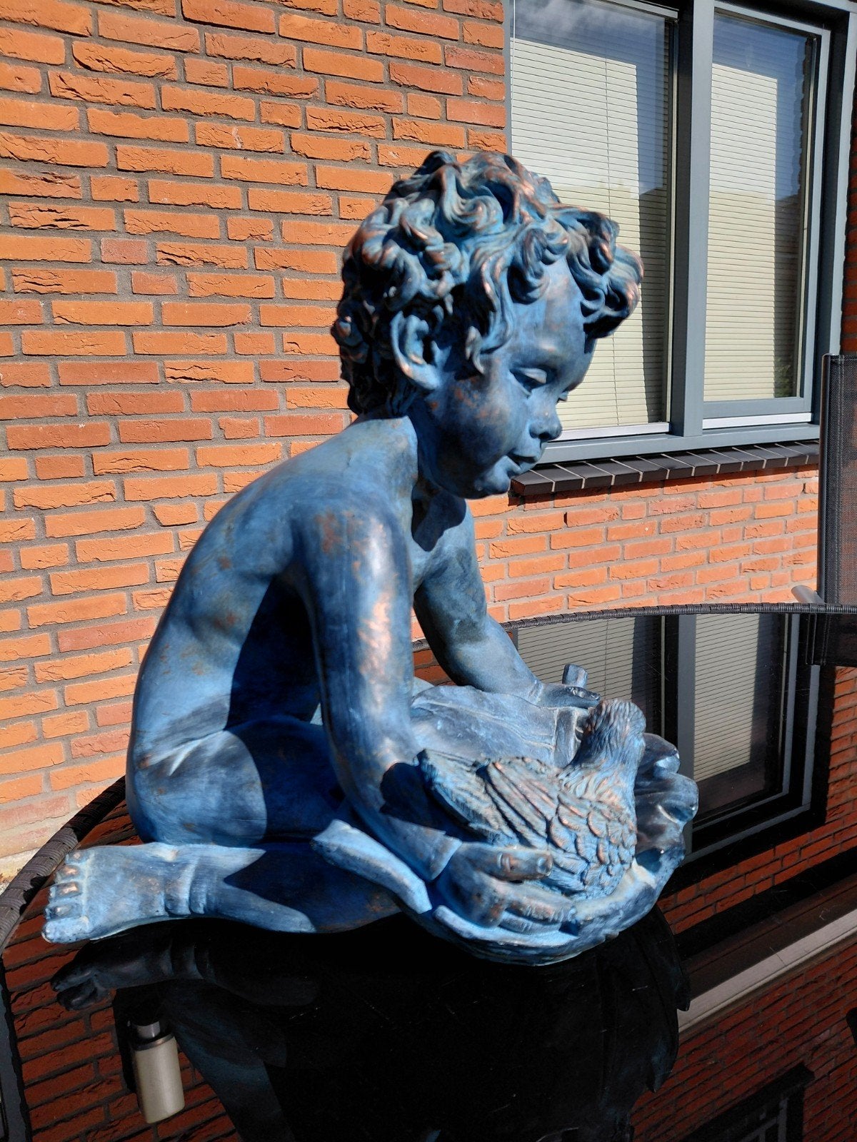 Polystone beeld van Putti met vogeltje, Ophalen of Verzenden