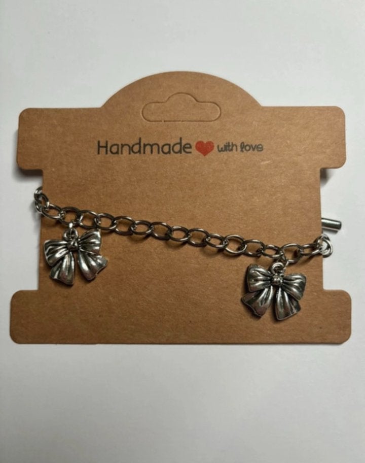 Armband strikjes zilver, Ophalen of Verzenden, Nieuw, Zilver, Overige materialen
